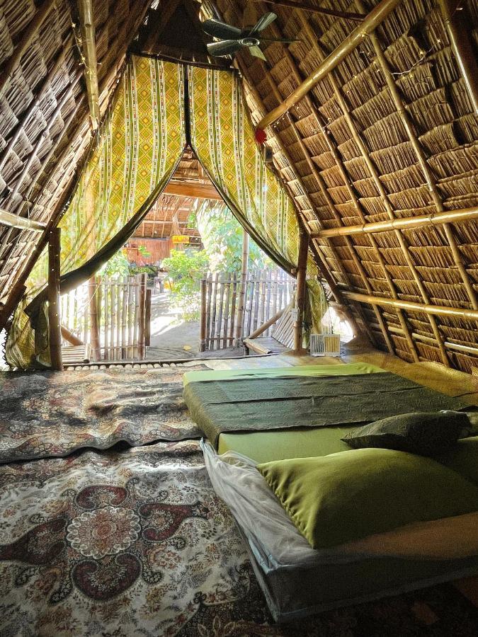 Tribal Huts Community Hostel Daanbantayan Kültér fotó